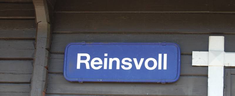 Bilde av skilt Reinsvoll stasjon