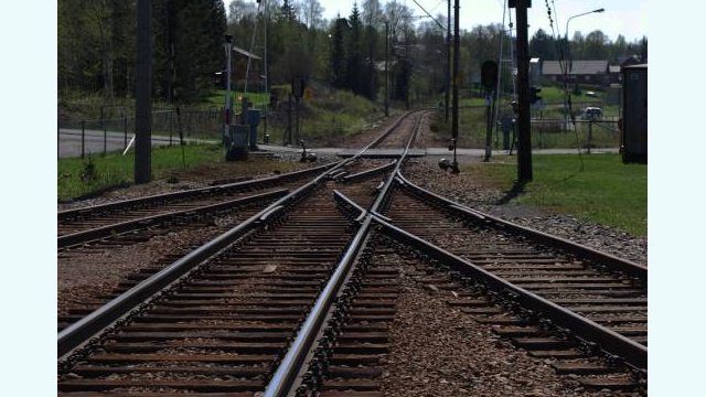 Raufoss stasjon (Fotograf: Solfrid Myhre, (c)Arkivnett Oppland) Bilde av togspor Raufoss stasjon